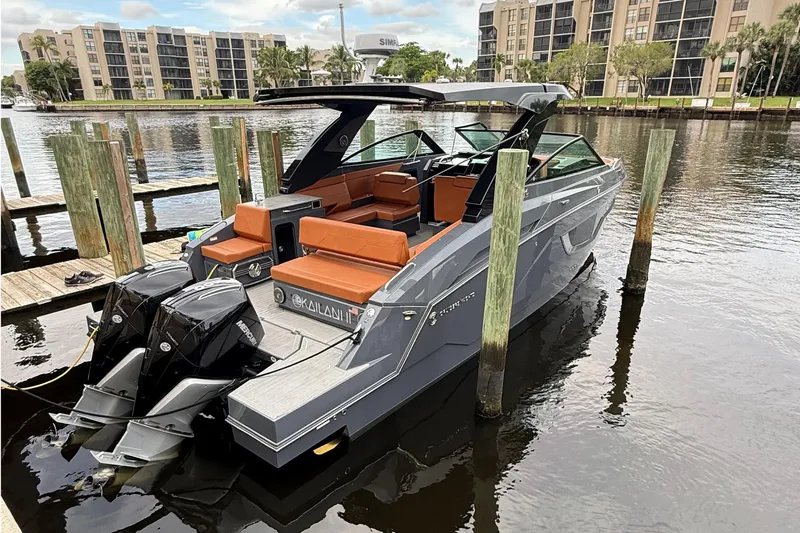 Kailani II Yacht Photos Pics 2023 Cruisers Yachts 34 GLS OB docked, featuring sleek design and dual outboard engines.