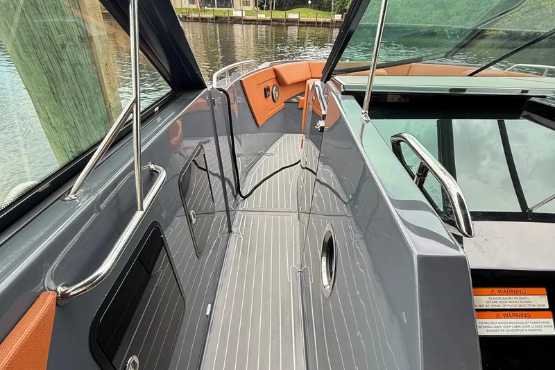 Kailani II Yacht Photos Pics 2023 Cruisers Yachts 34 GLS OB boat deck with sleek design and modern features.