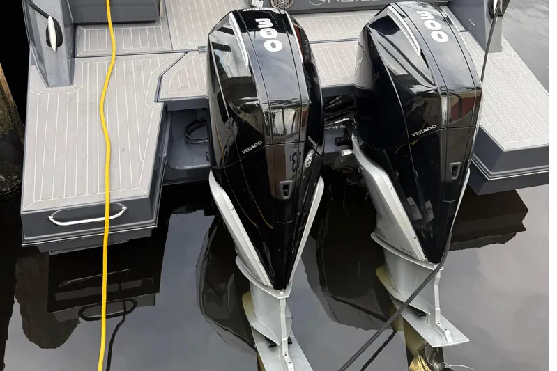 Kailani II Yacht Photos Pics 2023 Cruisers Yachts 34 GLS OB with dual Mercury Verado 300 engines docked.