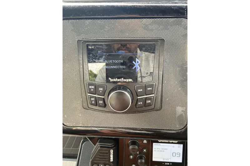 Kailani II Yacht Photos Pics 2023 Cruisers Yachts 34 GLS OB audio system with Bluetooth disconnected display.