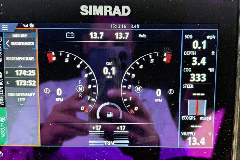 Kailani II Yacht Photos Pics Simrad display on 2023 Cruisers Yachts 34 GLS OB showing engine and navigation data.