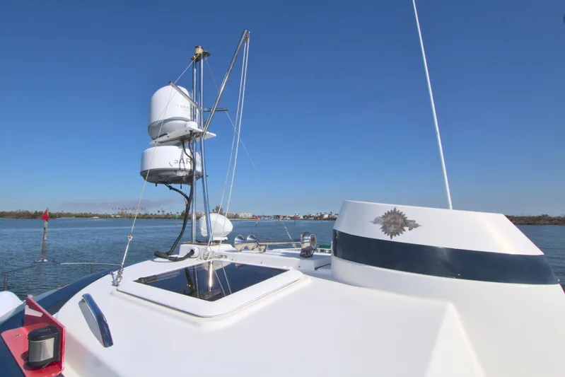  Yacht Photos Pics 2011 Ranger Tugs R-29 boat deck with radar equipment on a sunny day.