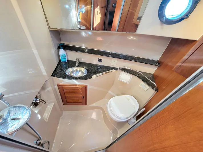  Yacht Photos Pics 2011 Ranger Tugs R-29 boat bathroom with sink, toilet, and shower.
