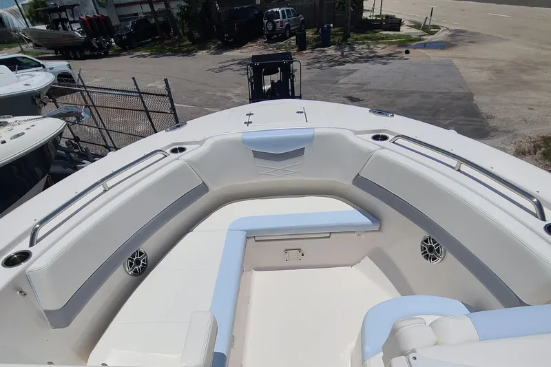  Yacht Photos Pics 2024 Robalo R317 Dual Console boat with spacious seating and sleek design.
