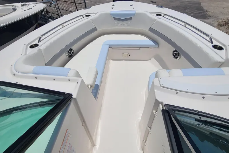  Yacht Photos Pics 2024 Robalo R317 Dual Console boat interior with spacious seating and modern design.