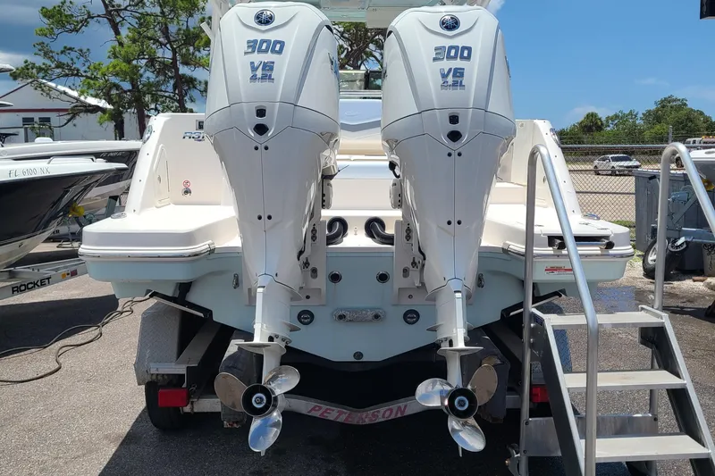  Yacht Photos Pics 2024 Robalo R317 Dual Console with twin 300 V6 engines, rear view.