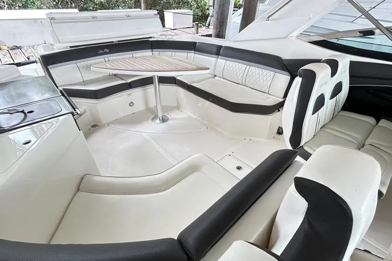 2018 Sea Ray 350 Slx @ Cancun Yacht Photos Pics 2018 Sea Ray SLX 350 boat interior with luxurious seating and a central table.
