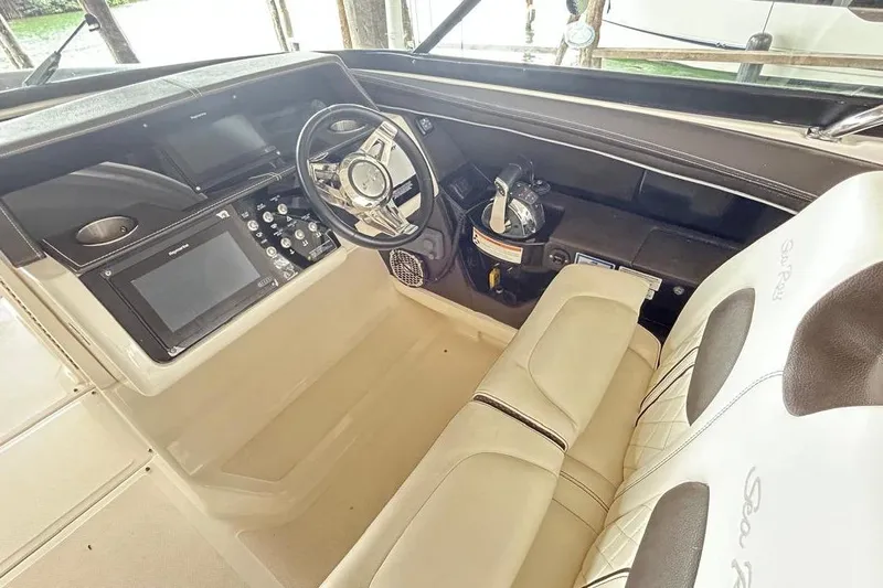 2018 Sea Ray 350 Slx @ Cancun Yacht Photos Pics 2018 Sea Ray SLX 350 boat cockpit with modern steering and control panels.