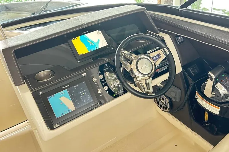 2018 Sea Ray 350 Slx @ Cancun Yacht Photos Pics 2018 Sea Ray SLX 350 helm with dual navigation screens and modern steering wheel.
