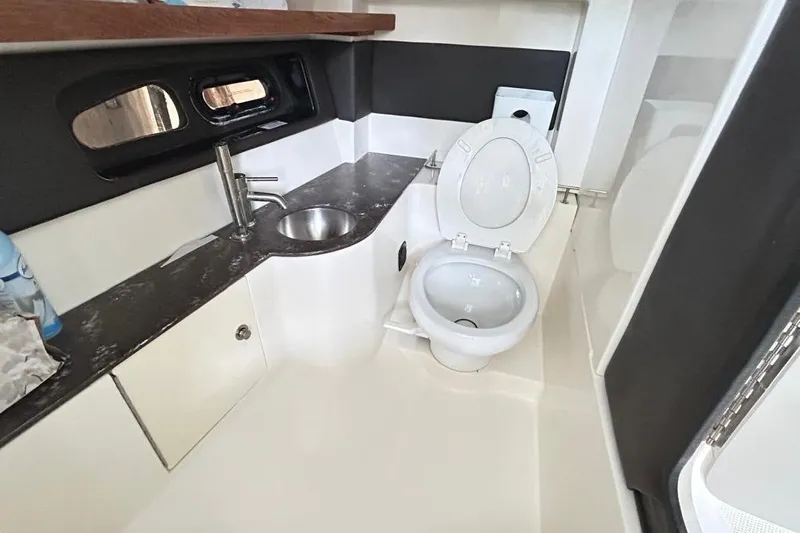 2018 Sea Ray 350 Slx @ Cancun Yacht Photos Pics 2018 Sea Ray SLX 350 boat bathroom with sink and toilet.