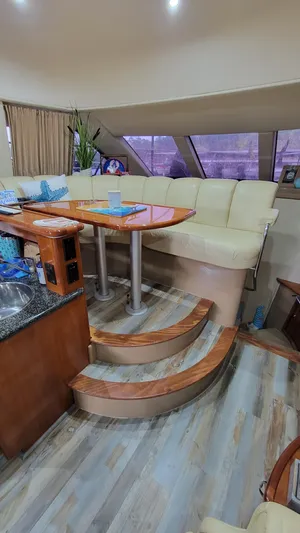  Yacht Photos Pics Interior of 2004 Carver 360 Sport Sedan with seating and dining area.