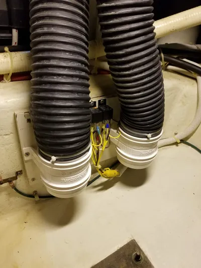  Yacht Photos Pics 2004 Carver 360 Sport Sedan engine room with ventilation hoses and wiring.