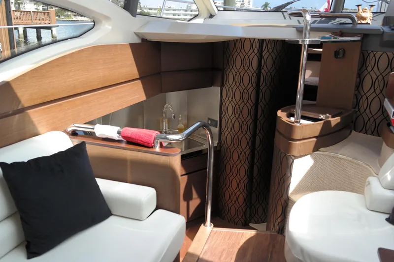 Fantasia 04 Yacht Photos Pics Interior of 2009 Azimut 43S yacht, featuring elegant wood finishes and modern design.