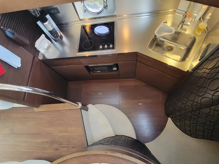 Fantasia 04 Yacht Photos Pics 2009 Azimut 43S yacht interior kitchen with modern appliances and sleek design.