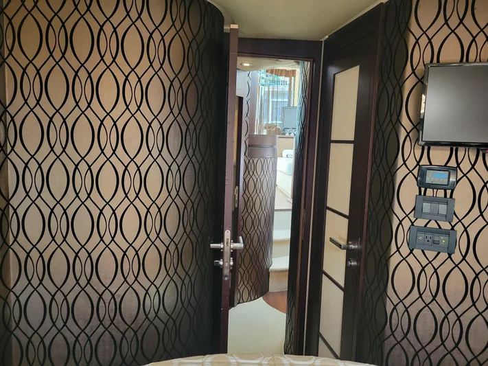 Fantasia 04 Yacht Photos Pics Interior of 2009 Azimut 43S yacht with patterned walls and modern door design.