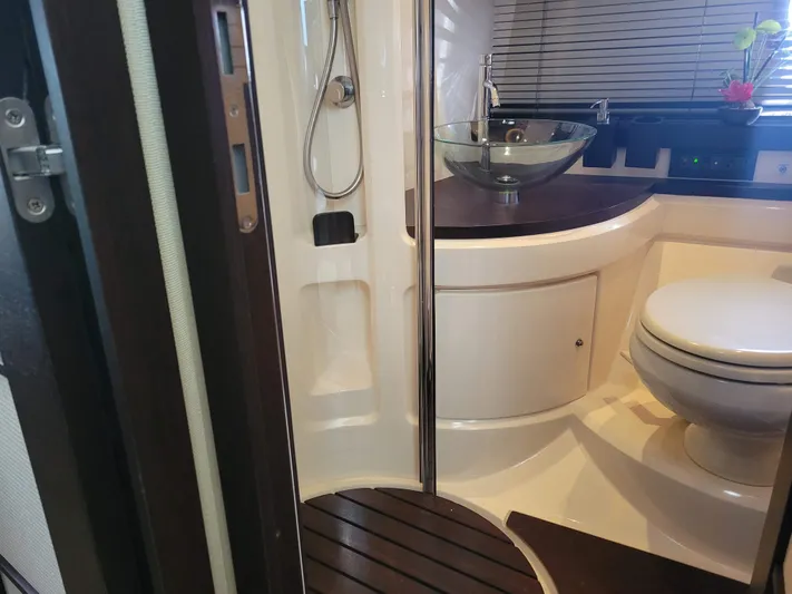 Fantasia 04 Yacht Photos Pics Luxurious bathroom in 2009 Azimut 43S yacht, featuring modern fixtures and elegant design.