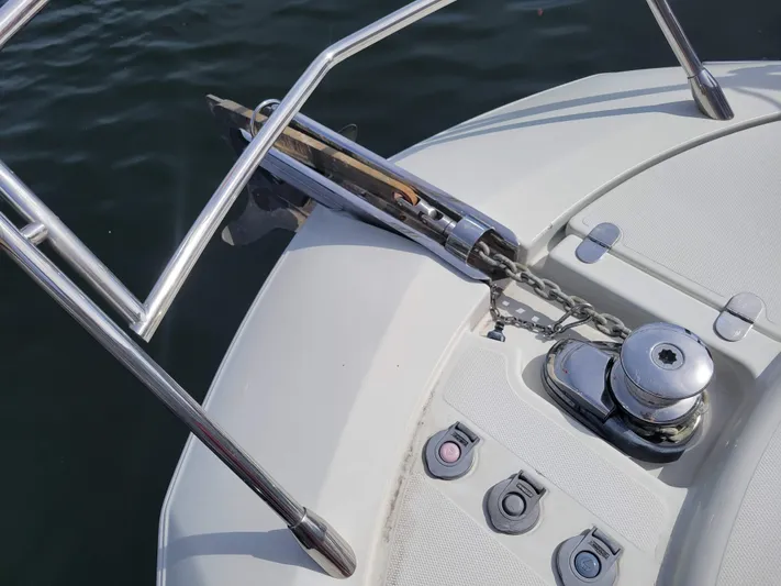 Fantasia 04 Yacht Photos Pics Bow of 2009 Azimut 43S yacht with anchor and winch system.