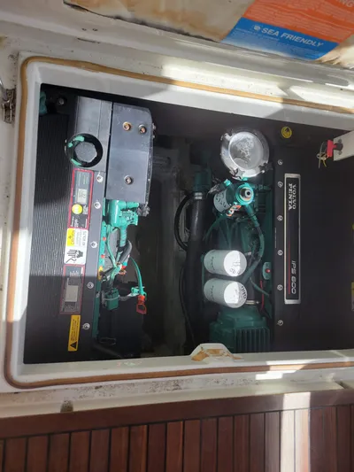 Fantasia 04 Yacht Photos Pics Engine compartment of a 2009 Azimut 43S yacht, showcasing mechanical components.