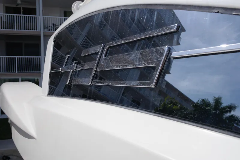 Fantasia 04 Yacht Photos Pics 2009 Azimut 43S yacht with sleek design and reflective windows.