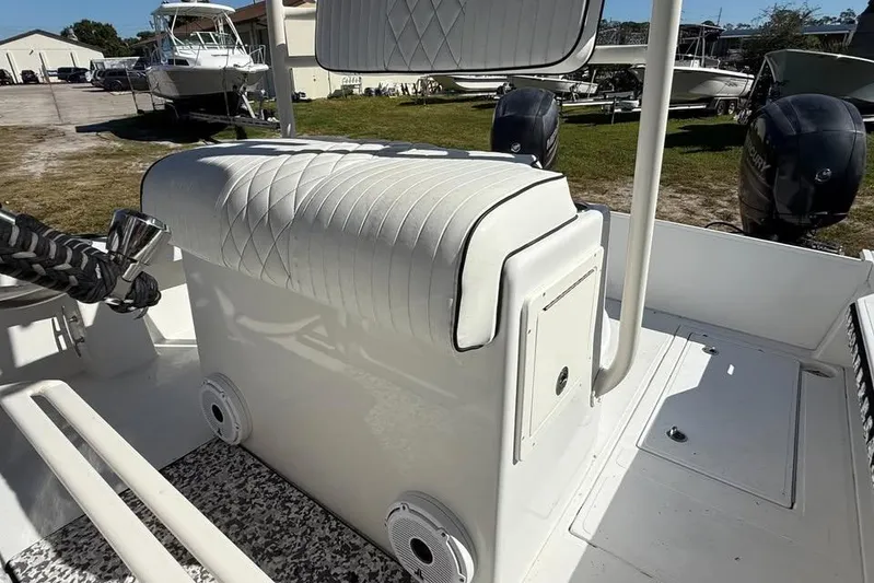  Yacht Photos Pics 2015 Calcutta 263 boat interior with cushioned seating and dual outboard motors.