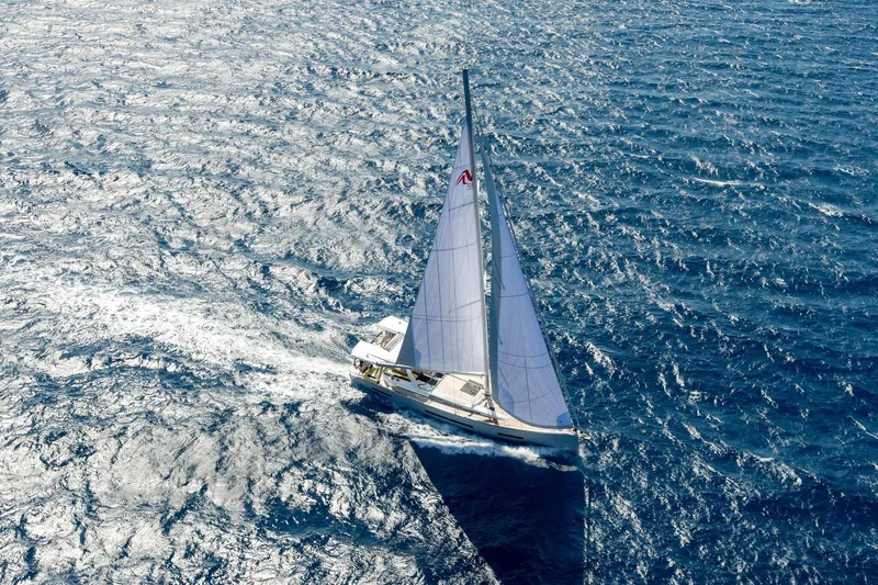  Yacht Photos Pics Sailing yacht Hanse 590 (2026) navigating through open ocean waters.