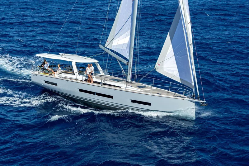  Yacht Photos Pics Sailing on the ocean, 2026 Hanse 590 yacht with passengers enjoying the sea.