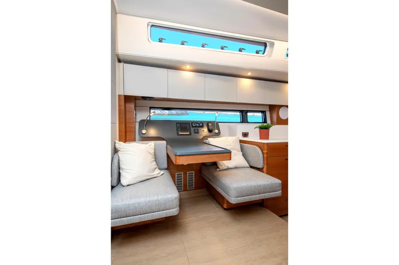  Yacht Photos Pics Luxurious interior of 2026 Hanse 590 yacht with modern seating and elegant decor.