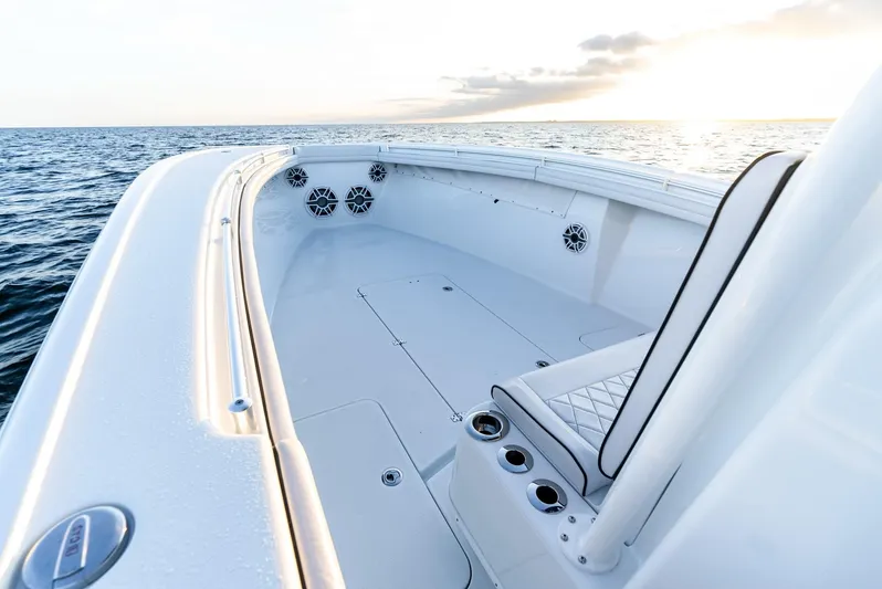  Yacht Photos Pics 2023 Yellowfin 34 boat interior with ocean view at sunset.