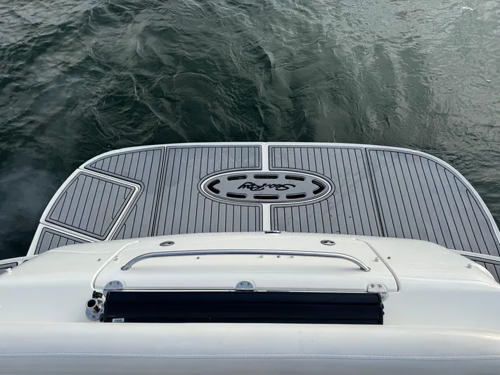 Yacht Photos Pics Rear view of 2004 Sea Ray 360 Sundancer swim platform on water.