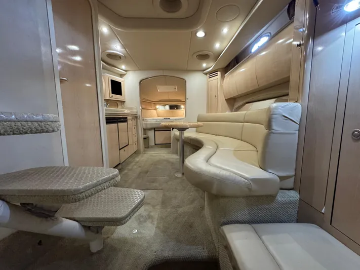  Yacht Photos Pics Luxurious interior of 2004 Sea Ray 360 Sundancer yacht with plush seating and modern amenities.