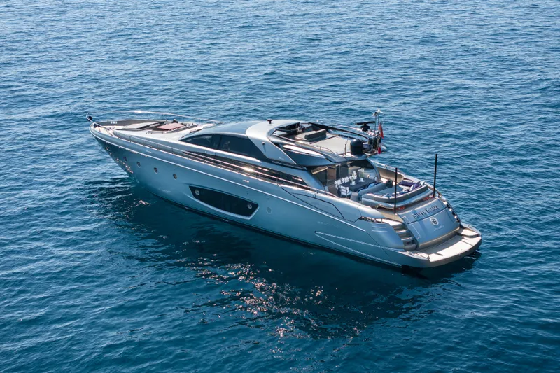 Silver Breeze Yacht Photos Pics Luxury 2010 Riva Domino 86 yacht cruising on open blue sea.