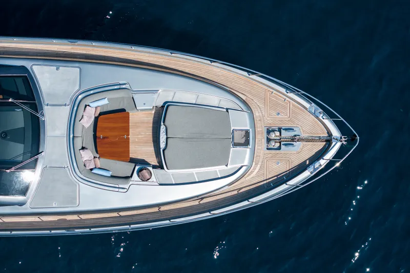 Silver Breeze Yacht Photos Pics Aerial view of 2010 Riva Domino 86 yacht on blue water.