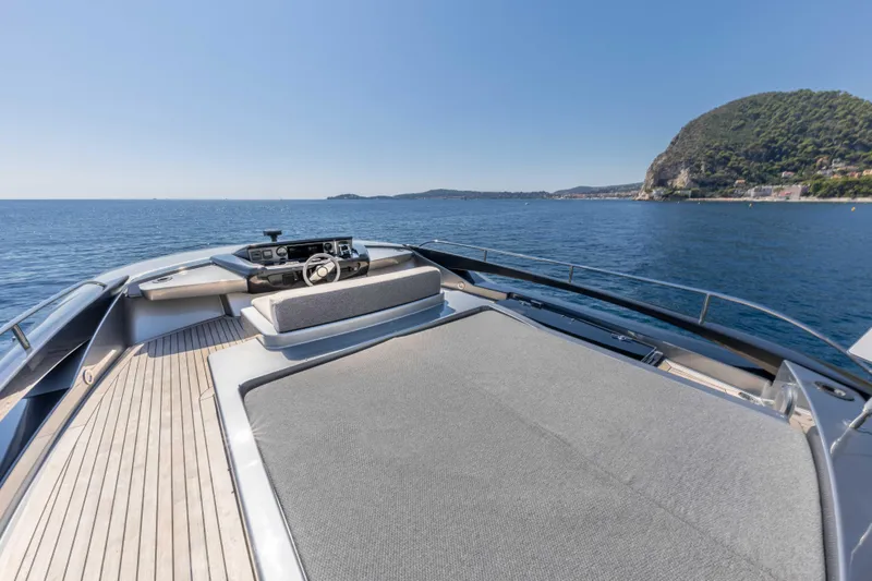 Silver Breeze Yacht Photos Pics Luxurious 2010 Riva Domino 86 yacht deck with scenic ocean view.