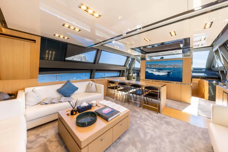 Silver Breeze Yacht Photos Pics Luxurious interior of 2010 Riva Domino 86 yacht with modern furnishings and sea view.
