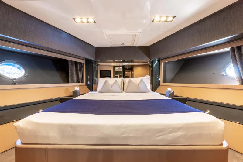 Silver Breeze Yacht Photos Pics Luxurious bedroom interior of 2010 Riva Domino 86 yacht with modern design and ambient lighting.