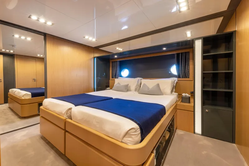 Silver Breeze Yacht Photos Pics Luxurious bedroom interior of 2010 Riva Domino 86 yacht with modern design and cozy ambiance.