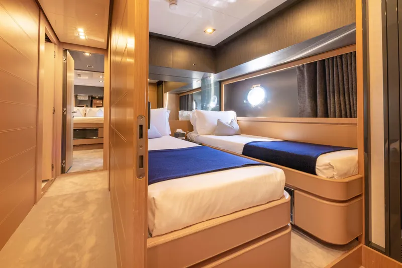 Silver Breeze Yacht Photos Pics Luxurious interior of 2010 Riva Domino 86 yacht with twin beds and modern decor.