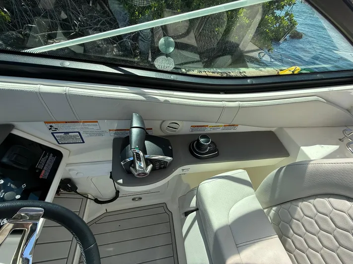  Yacht Photos Pics 2022 Sea Ray Sundancer 320 Outboard helm with controls and seating.