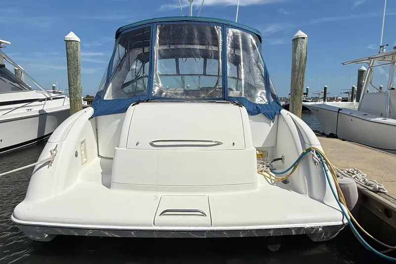  Yacht Photos Pics 1999 Formula 400 Super Sport boat docked at marina, rear view.