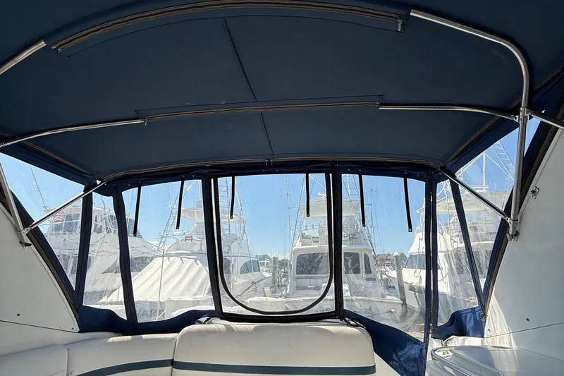  Yacht Photos Pics Interior view of a 1999 Formula 400 Super Sport boat with marina backdrop.