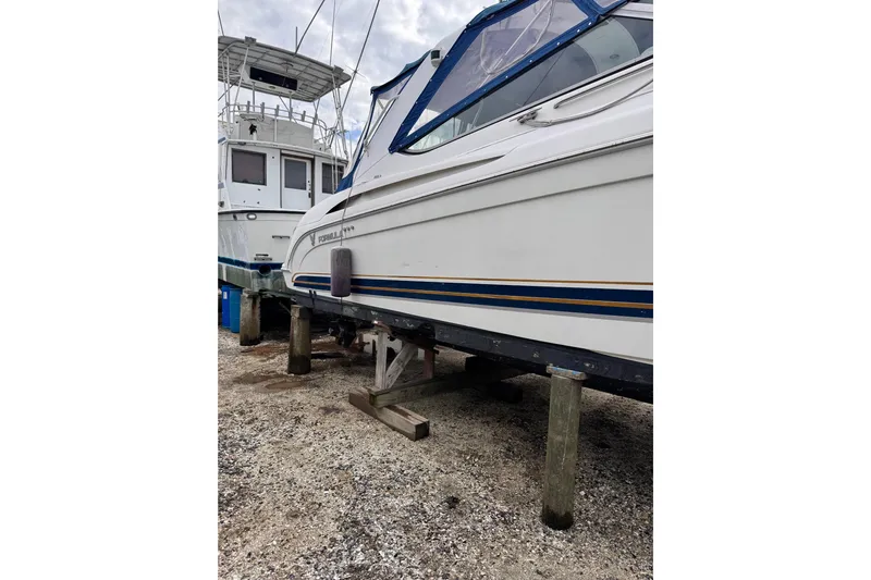  Yacht Photos Pics 1999 Formula 400 Super Sport boat on dry dock, side view.