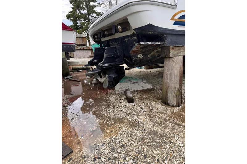  Yacht Photos Pics 1999 Formula 400 Super Sport boat on stands, showing stern and outdrive.