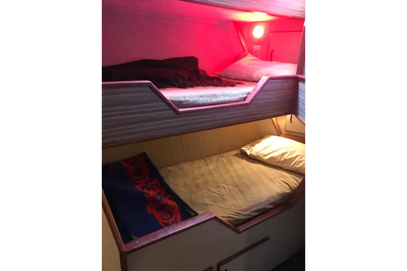  Yacht Photos Pics Bunk beds in 1973 Custom 58&rsquo; Steel Marco Seiner with cozy lighting.