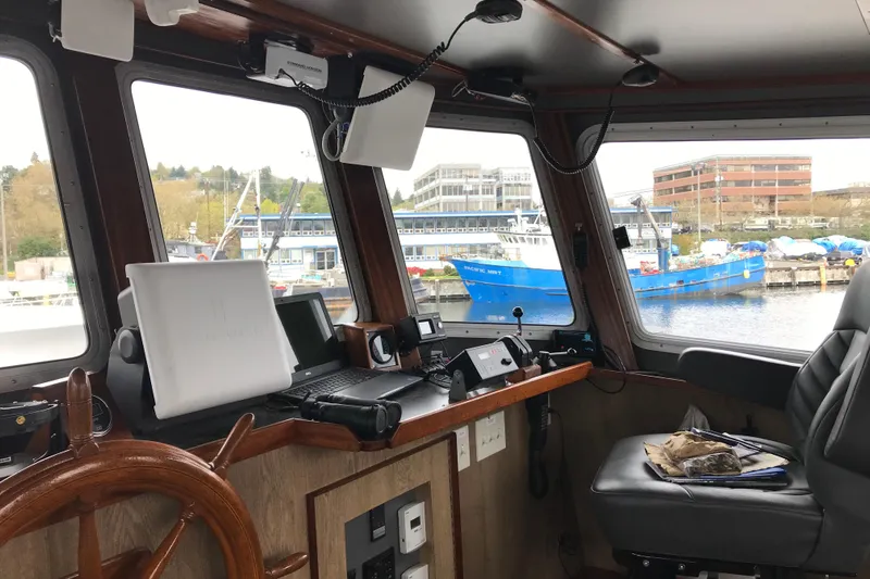  Yacht Photos Pics Interior of a 1973 Custom 58&rsquo; Steel Marco Seiner boat with navigation equipment.