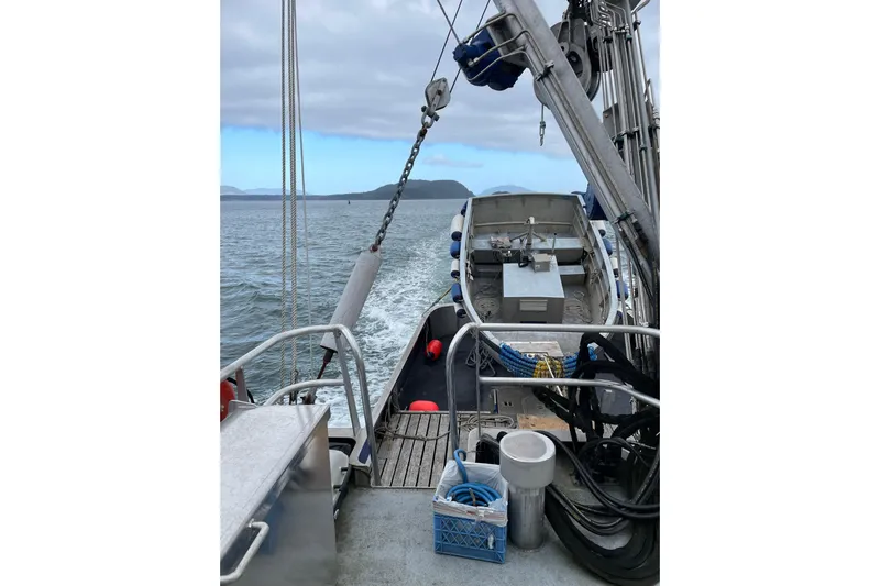  Yacht Photos Pics 1973 Custom 58&rsquo; Steel Marco Seiner on open water, showcasing deck and equipment.