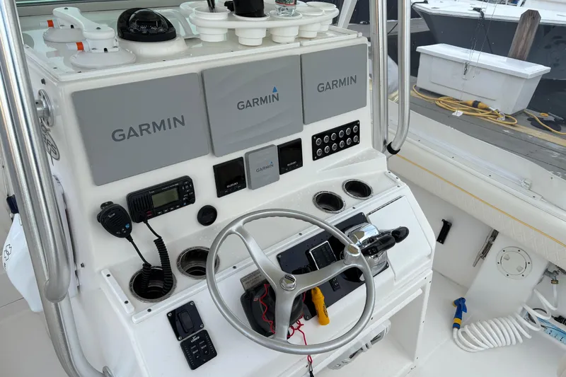 Plan B Yacht Photos Pics Control panel of a 2006 Regulator 32 Forward Seating boat with Garmin electronics.