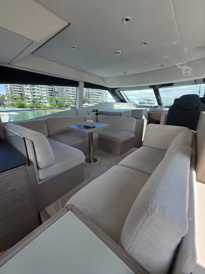 Ferretti Yachts 500 Yacht Photos Pics Luxurious interior of 2022 Ferretti Yachts 500 with modern seating and panoramic windows.