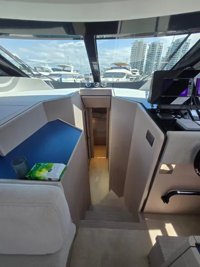 Ferretti Yachts 500 Yacht Photos Pics Interior view of 2022 Ferretti Yachts 500, featuring modern design and sleek navigation equipment.