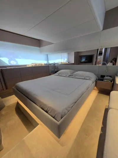 Ferretti Yachts 500 Yacht Photos Pics Luxurious bedroom interior of 2022 Ferretti Yachts 500, featuring a modern design and elegant furnishings.