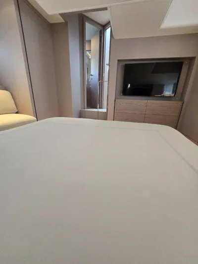 Ferretti Yachts 500 Yacht Photos Pics Luxurious interior of 2022 Ferretti Yachts 500, featuring a modern bedroom design.